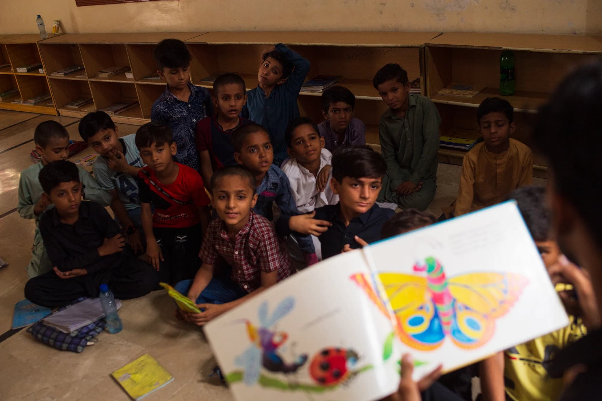 Children gathered for a meal at one of the Nourished USA feeding programs in Pakistan